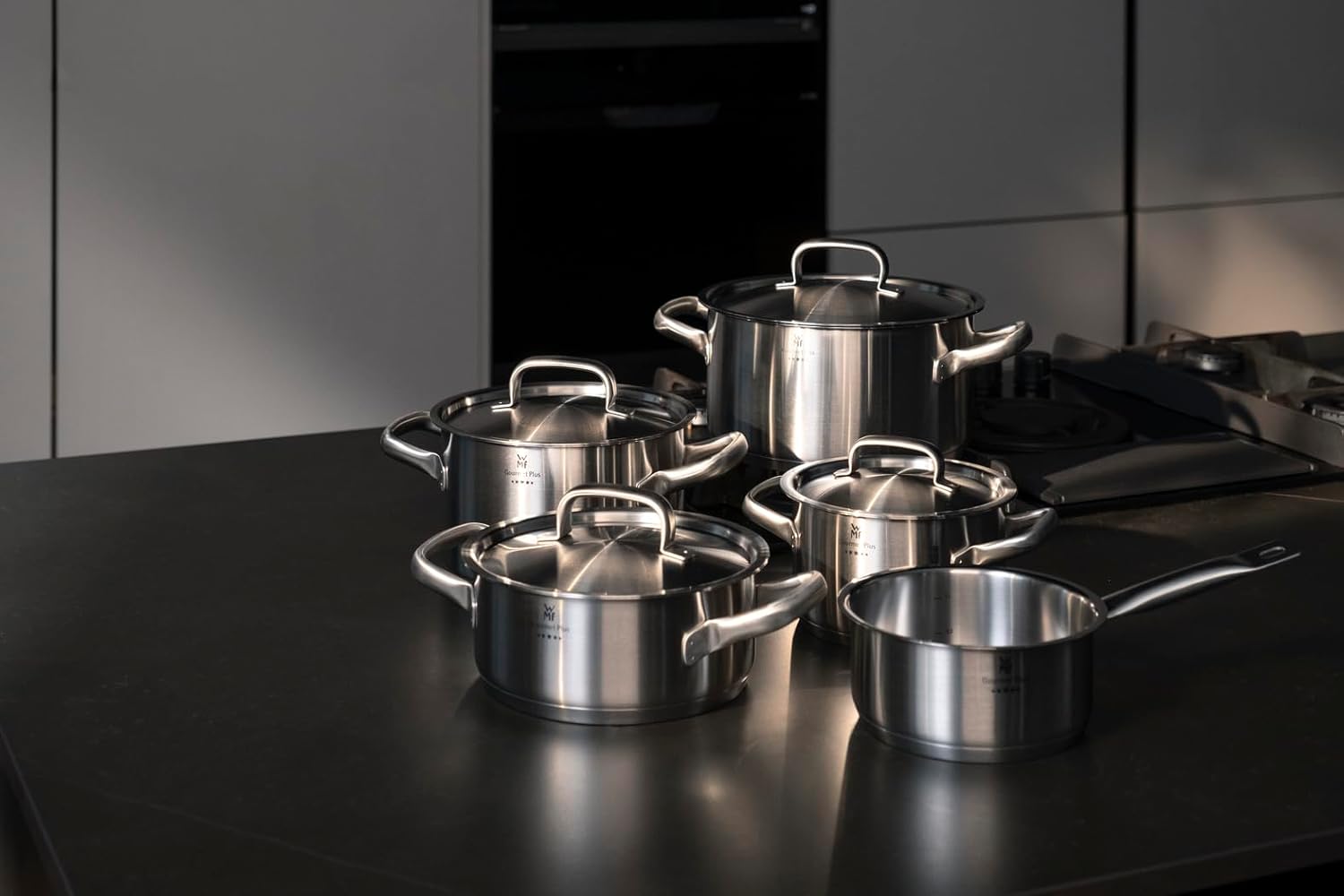 WMF Gourmet Plus - Batterie de cuisine 5 pièces, compatible induction, acier inoxydable, 1 casserole basse 20 cm, 3 casseroles hautes 16 cm, 20 cm et 24 cm, 1 casserole 16 cm avec 4 couvercles en acier inoxydable